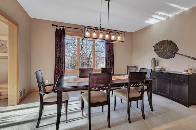 view of carpeted dining room