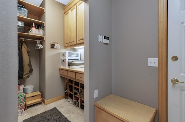 mudroom featuring light tile patterned floors