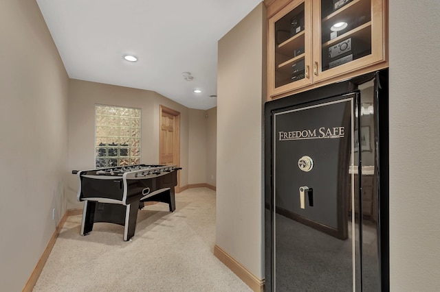 game room with light colored carpet