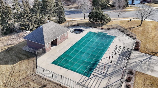 view of swimming pool featuring a patio area