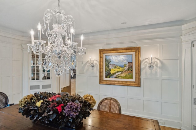 5231 Clinton Ave, Minneapolis, MN 55419 - dining space with wood-type flooring, a notable chandelier, and a decorative wall