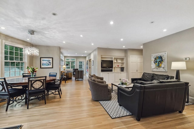 5231 Clinton Ave, Minneapolis, MN 55419 - living area with recessed lighting, light wood-style flooring, and a chandelier