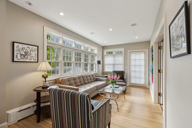 5231 Clinton Ave, Minneapolis, MN 55419 - living area featuring recessed lighting, light wood-style flooring, baseboards, and baseboard heating