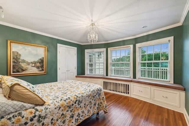 5231 Clinton Ave, Minneapolis, MN 55419 - bedroom featuring radiator heating unit, a notable chandelier, ornamental molding, and wood finished floors
