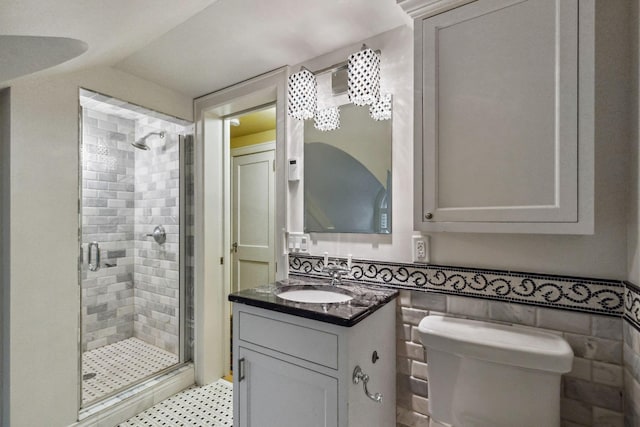 5231 Clinton Ave, Minneapolis, MN 55419 - bathroom featuring vanity, tile patterned floors, toilet, and a shower stall