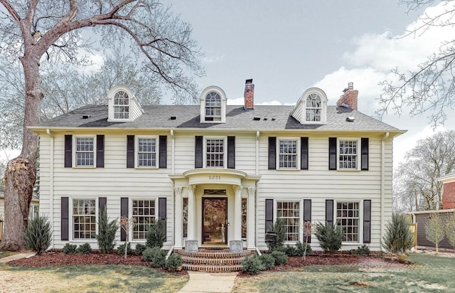 5231 Clinton Ave, Minneapolis, MN 55419 - colonial home with a chimney and a front yard