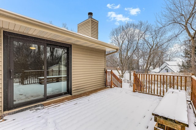 view of snow covered deck