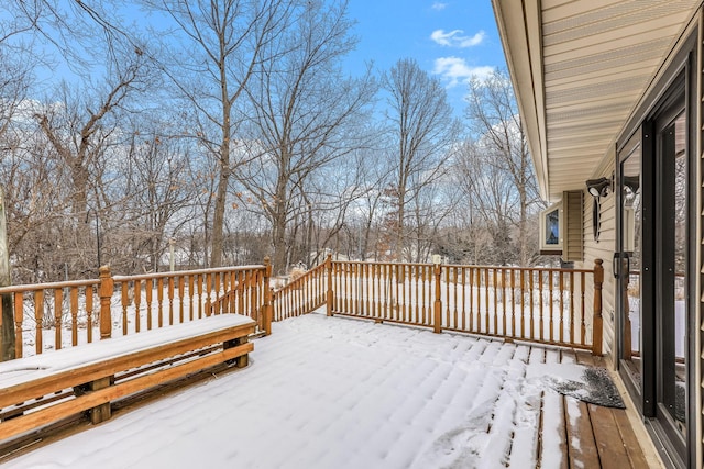 view of snow covered deck