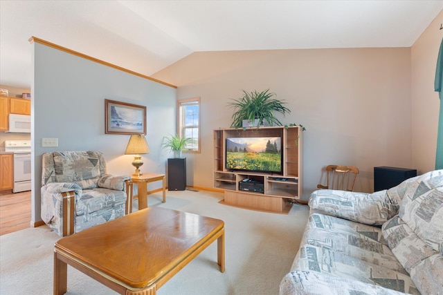 living room featuring light colored carpet and lofted ceiling