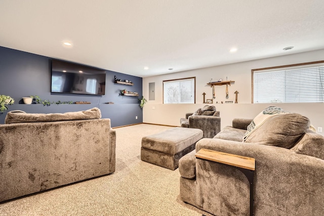 living area with recessed lighting, carpet, and baseboards