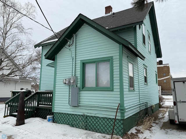 view of snow covered property