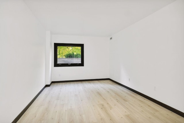 empty room featuring light wood-type flooring