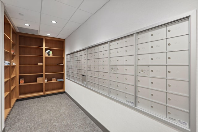 view of home's community featuring mail boxes