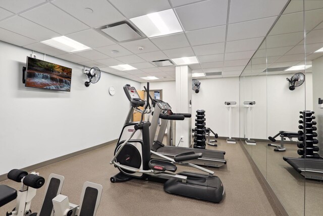 gym with a drop ceiling