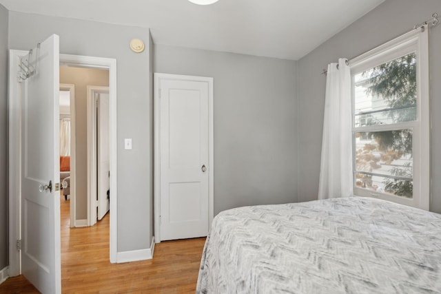 bedroom featuring light hardwood / wood-style flooring