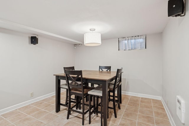 dining space with light tile patterned flooring