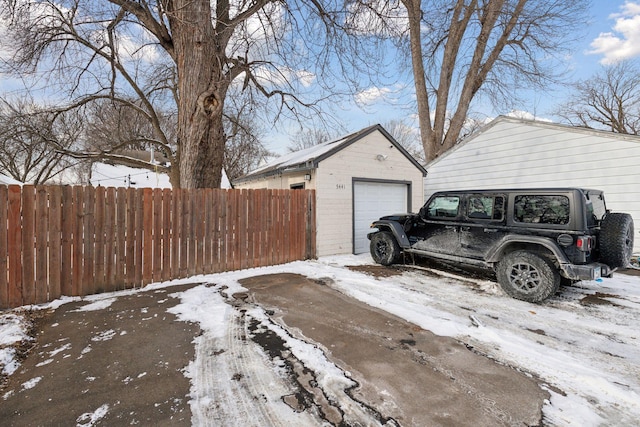 view of snow covered garage