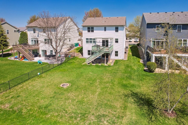 6789 Troy Ln N, Maple Grove, MN 55311 - back of house with stairs, a fire pit, a deck, and a patio area