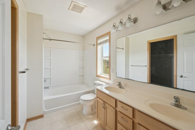6789 Troy Ln N, Maple Grove, MN 55311 - bathroom featuring shower / tub combination, tile patterned flooring, double vanity, toilet, and a textured ceiling