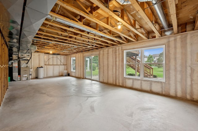 6789 Troy Ln N, Maple Grove, MN 55311 - basement featuring heating unit and water heater