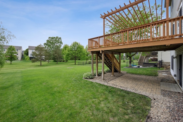 6789 Troy Ln N, Maple Grove, MN 55311 - view of green lawn with stairs, a patio, and a wooden deck
