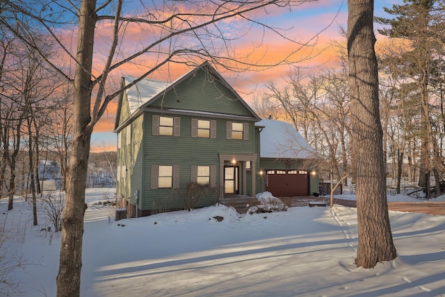 view of front of property with a garage