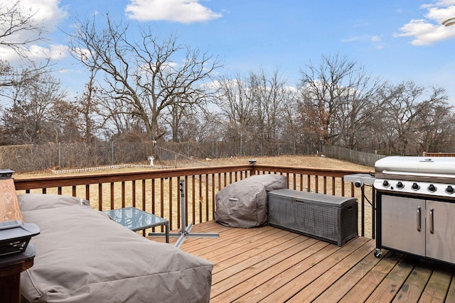 deck with a fenced backyard