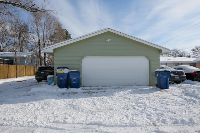 view of snow covered garage