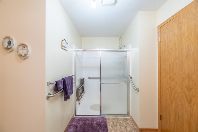 bathroom featuring walk in shower