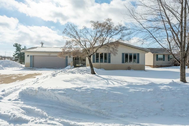 ranch-style home with a garage