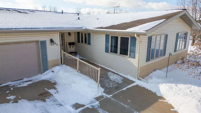 exterior space featuring a garage