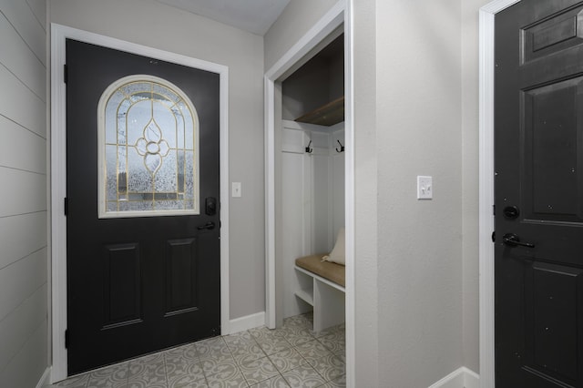 entrance foyer with light tile patterned floors