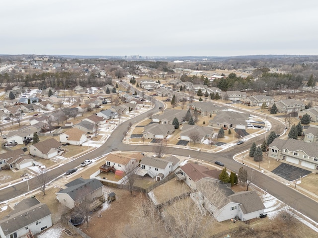 birds eye view of property with a residential view