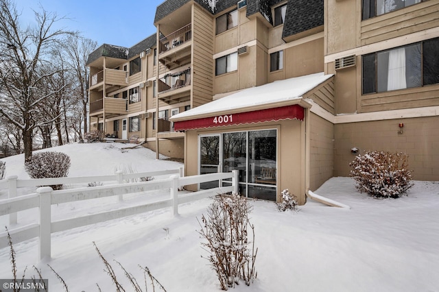 view of snow covered building