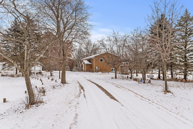 view of yard covered in snow