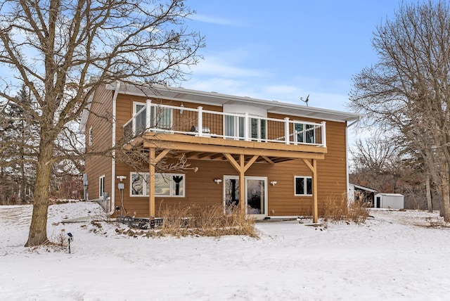 view of snow covered house