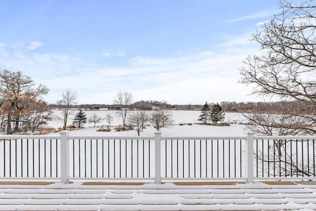 view of snow covered deck