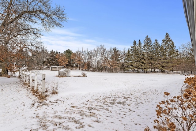 view of yard covered in snow