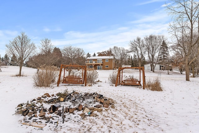 view of yard covered in snow