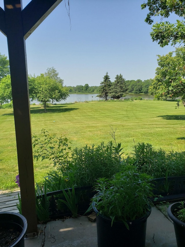 view of yard with a water view