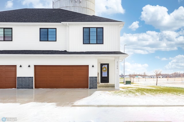 view of front of home featuring a garage