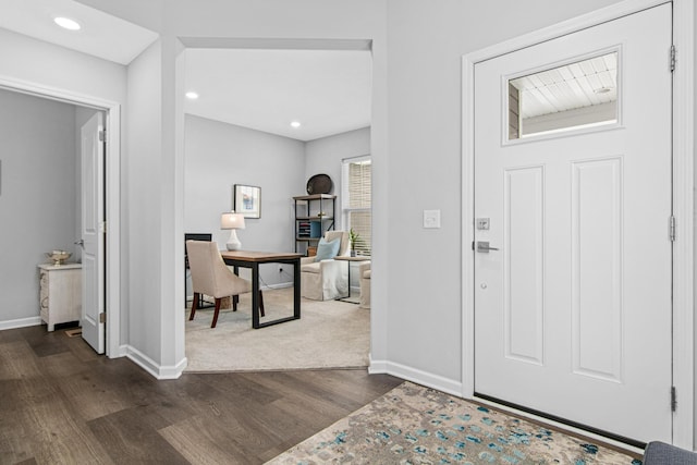 entryway featuring recessed lighting, baseboards, and dark wood-style flooring