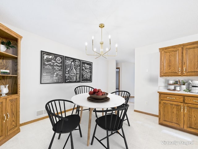 dining area with a notable chandelier, baseboards, visible vents, and light floors