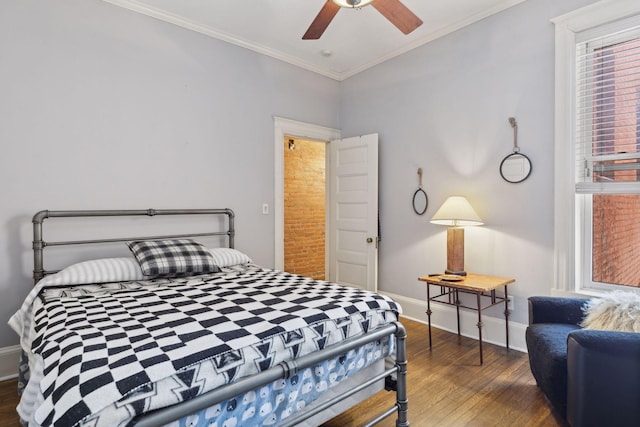 598 Summit Ave Unit 1, Saint Paul, MN 55102 - bedroom featuring wood finished floors, baseboards, crown molding, and a ceiling fan