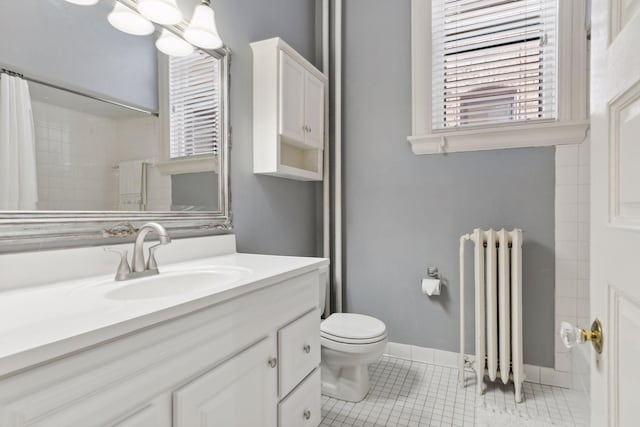 598 Summit Ave Unit 1, Saint Paul, MN 55102 - bathroom featuring radiator, vanity, toilet, and a shower with curtain