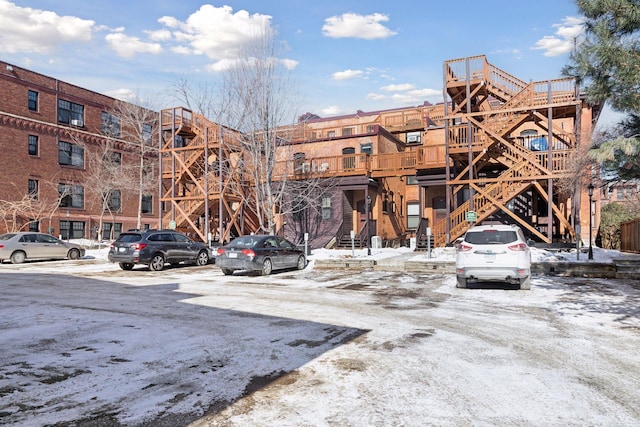598 Summit Ave Unit 1, Saint Paul, MN 55102 - view of property with uncovered parking and stairway