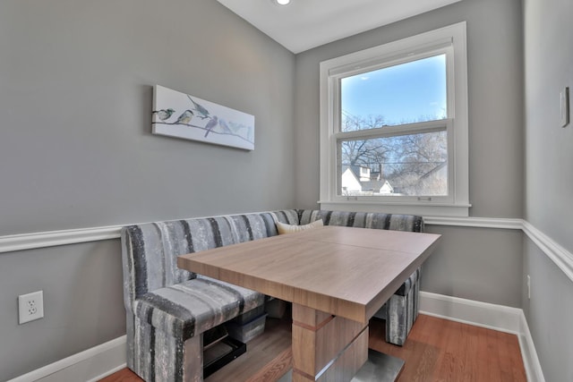 dining room with breakfast area and hardwood / wood-style floors