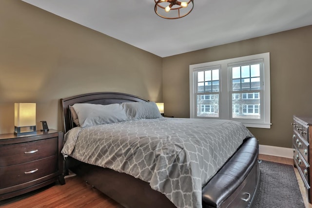 bedroom featuring dark wood-type flooring