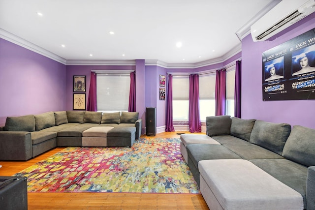 living area featuring ornamental molding, recessed lighting, light wood-style flooring, and a wall mounted AC