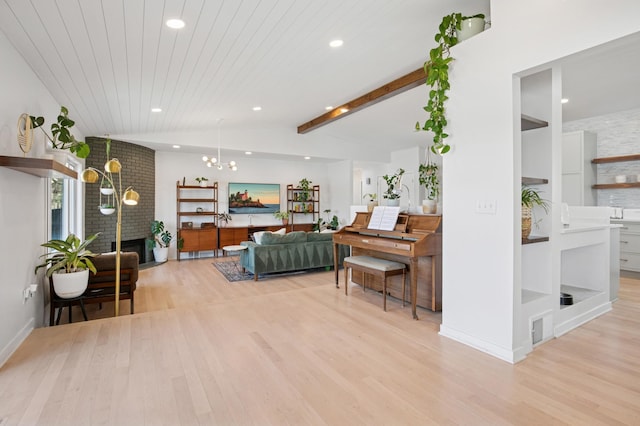 living area featuring visible vents, lofted ceiling with beams, light wood-style flooring, recessed lighting, and wood ceiling